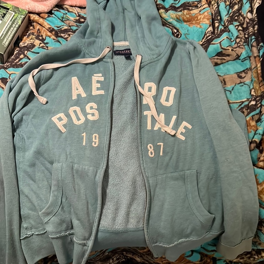 A turquoise color jacket